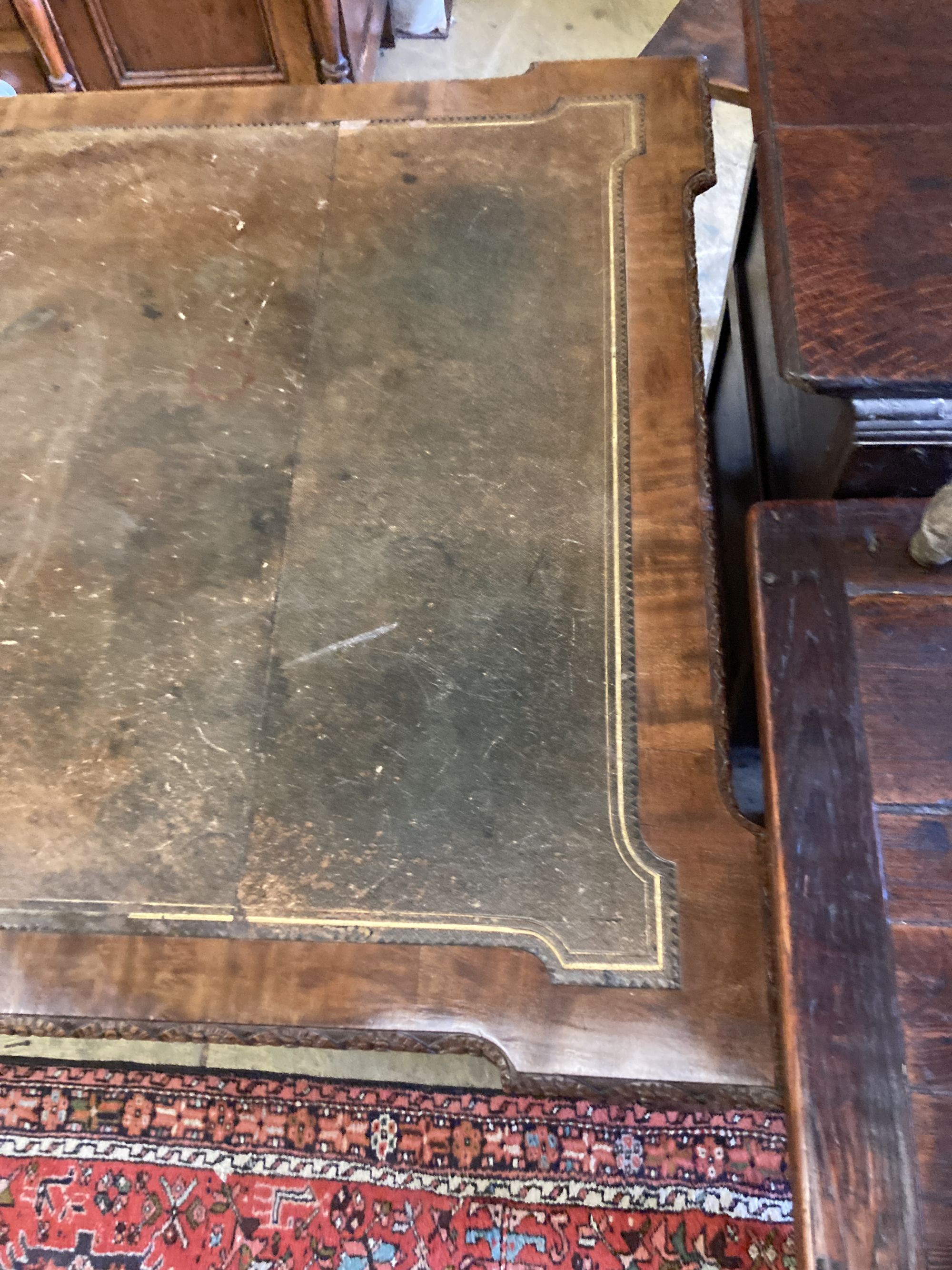 A George III style mahogany leather topped writing table, width 182cm, depth 104cm, height 76cm